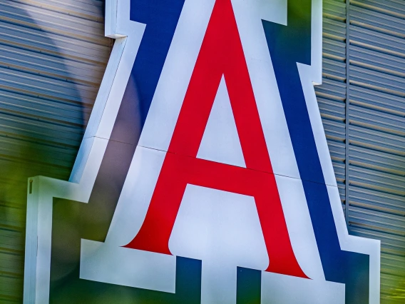 Block letter A with blue outer outline, and red inner outline. 