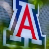 Block letter A with blue outer outline, and red inner outline. 
